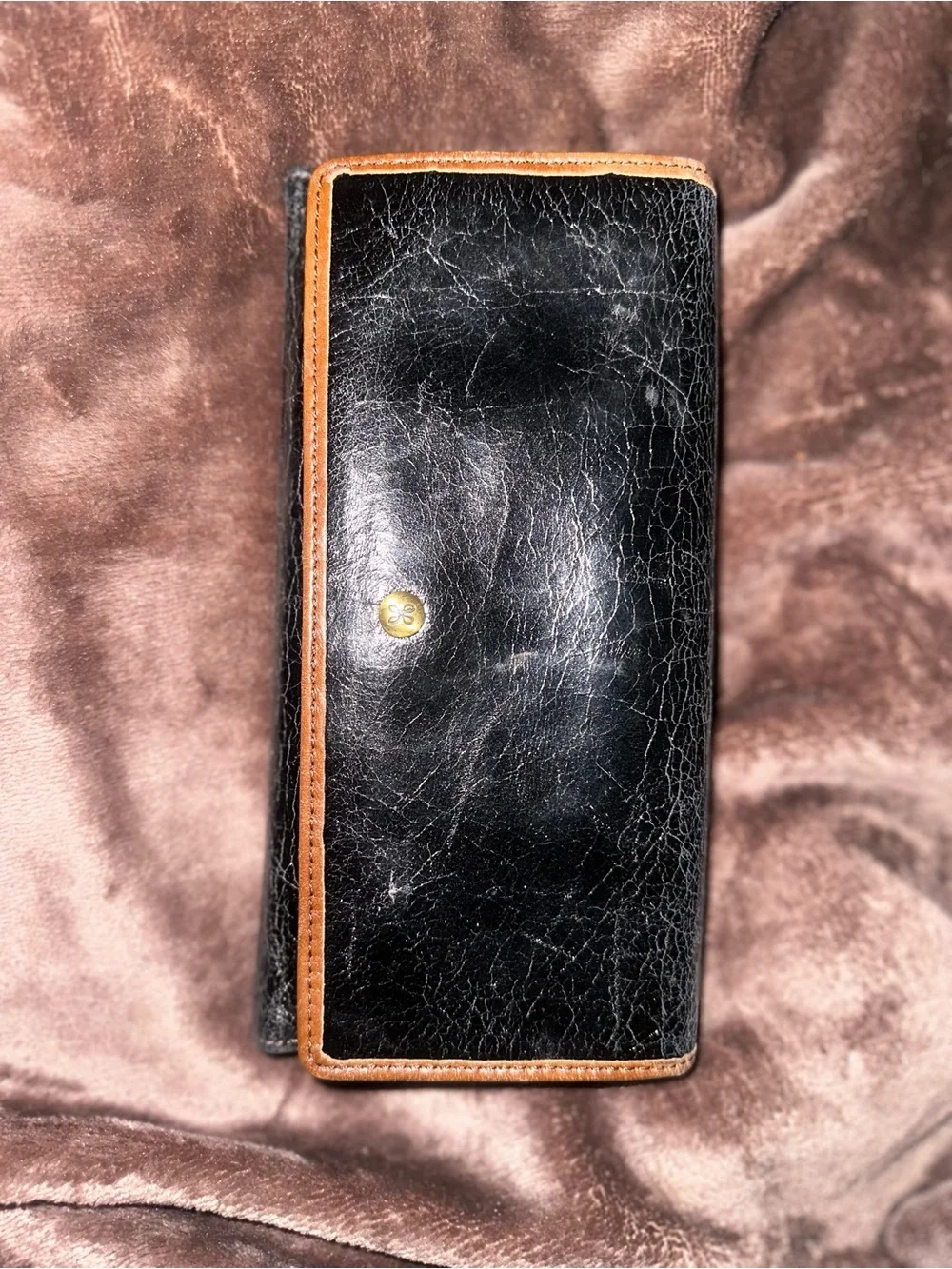 Black Leather Wallet with Brown Trim and Gold Logo